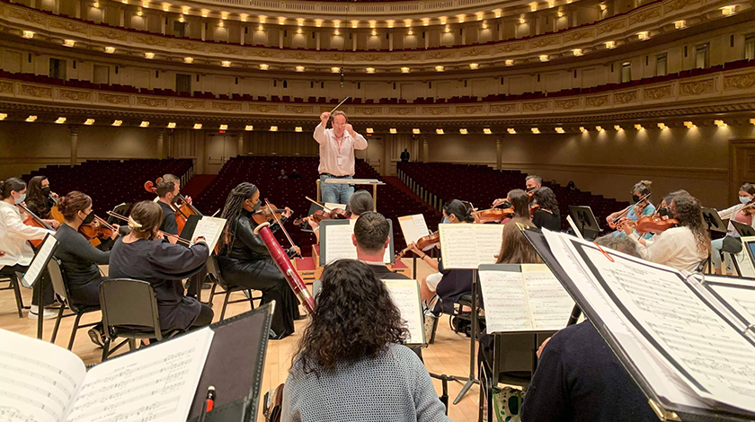 Justin Smith and orchestra at Carnegie Hall