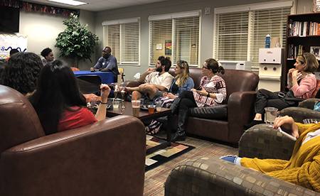 Students and faculty talking in DICE Lounge