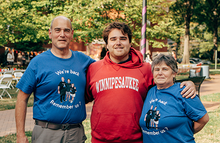 Queens student with parents