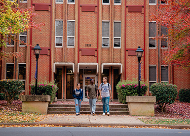 Students walking out of Barnhardt Residence Hall