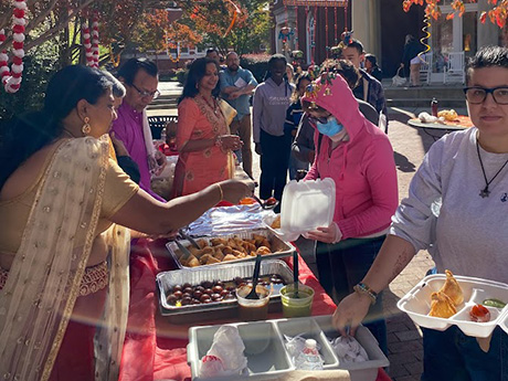 Students, staff eating at Diwali event
