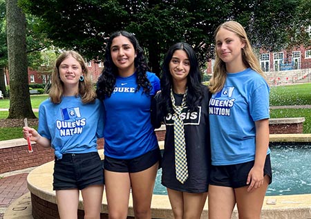 Liza Wright and friends in front of library fountain