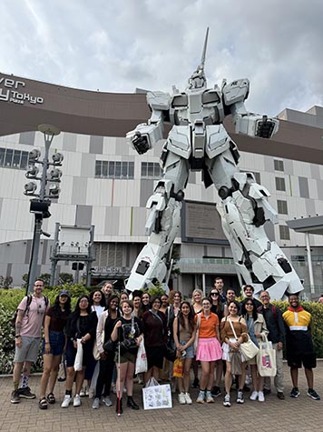 JBIP students in front of robot in Tokyo