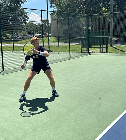 Luke Coppage playing tennis