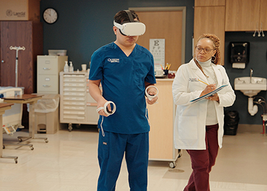 Students and professor using VR equipment